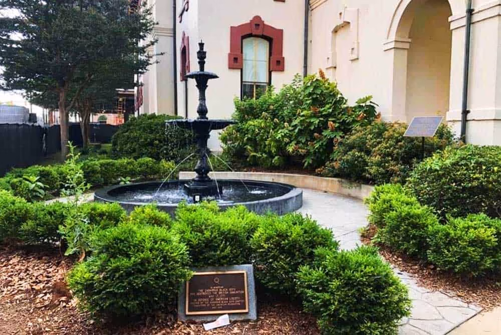 The fountain outside the Historic Cabarrus County Courthouse was installed by the Cabarrus Black Boys Chapter, Daughters of the American Revolution, in 1916, “In memory of the Cabarrus Black Boys who destroyed the British ammunition, May 17, 1771 – In defense of American Liberty.”